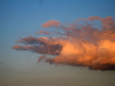 Reaching Cloud at Sunset